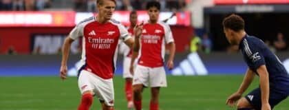Arsenal midfielder Martin Odegaard (8) dribbles the ball during the second half against the Manchester United at SoFi Stadium