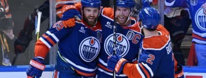 Edmonton Oilers center Leon Draisaitl (29) reacts with center Connor McDavid (97) and defenseman Evan Bouchard (2) after scoring a goal against the Florida Panthers during the first period in game two of the 2025 Stanley Cup Final at Rogers Place