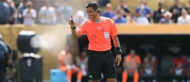 Referee Alireza Faghani gestures during the final of the 2025 FIFA Club World Cup between Paris Saint-Germain and Chelsea FC at MetLife Stadium.