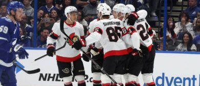 Ottawa Senators center Dylan Cozens (24) is congratulated after he scored a goal against the Tampa Bay Lightning during the first period at Benchmark International Arena.