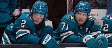 San Jose Sharks center Will Smith (2) and center Macklin Celebrini (71) watch the action against the Boston Bruins from the bench in the second period at SAP Center in San Jose.
