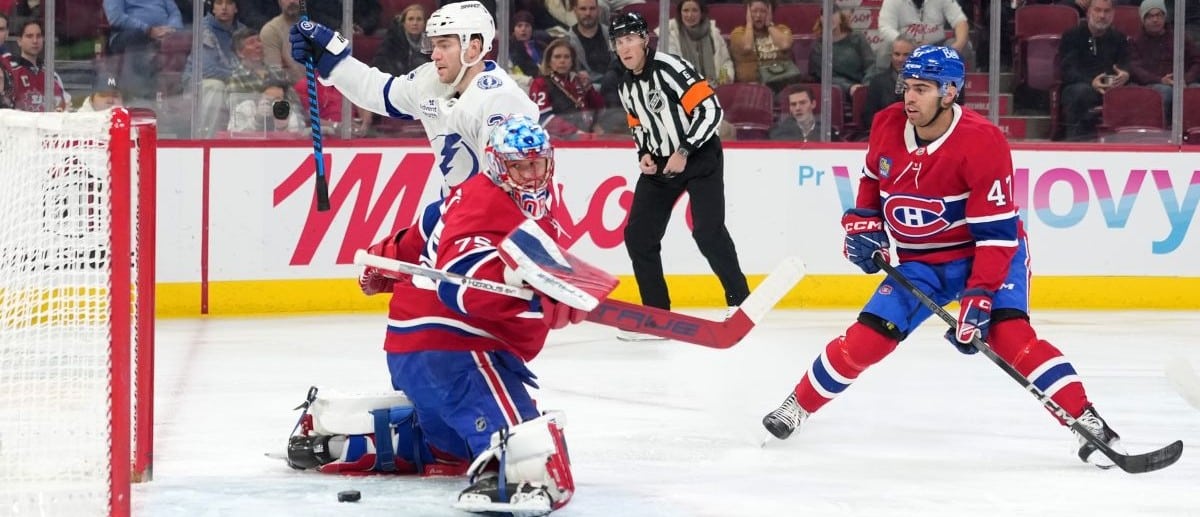 Tampa Bay Lightning forward Brayden Point (21) scores a goal against Montreal Canadiens goalie Jakub Dobes (75) during the first period at the Bell Centre