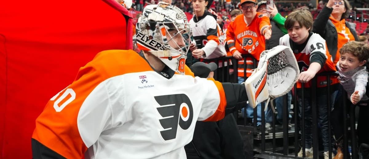 Philadelphia Flyers goaltender Dan Vladar (80) greets fans on his way to the warmups before the game against the Carolina Hurricanes at Lenovo Center.