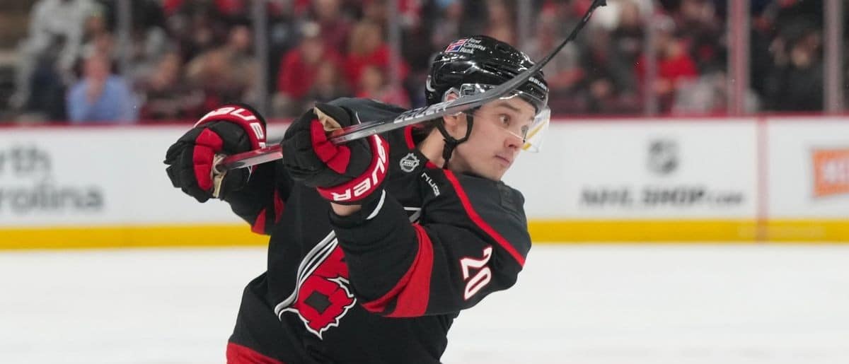 Carolina Hurricanes center Sebastian Aho (20) scores a goal on his shot against the Tampa Bay Lightning during the third period at Lenovo Center