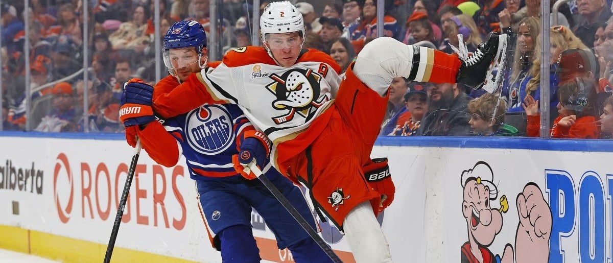 Edmonton Oilers forward Zach Hyman (18) trips up Anaheim Ducks defensemen Jackson LaCombe (2) during the third period at Rogers Place