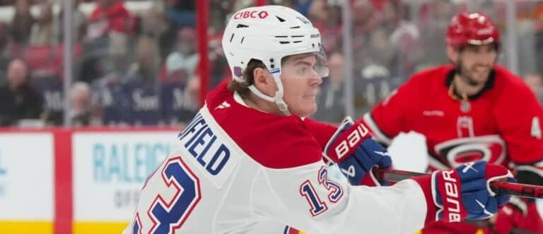 Montreal Canadiens right wing Cole Caufield (13) scores a goal against the Carolina Hurricanes during the second period at Lenovo Center.