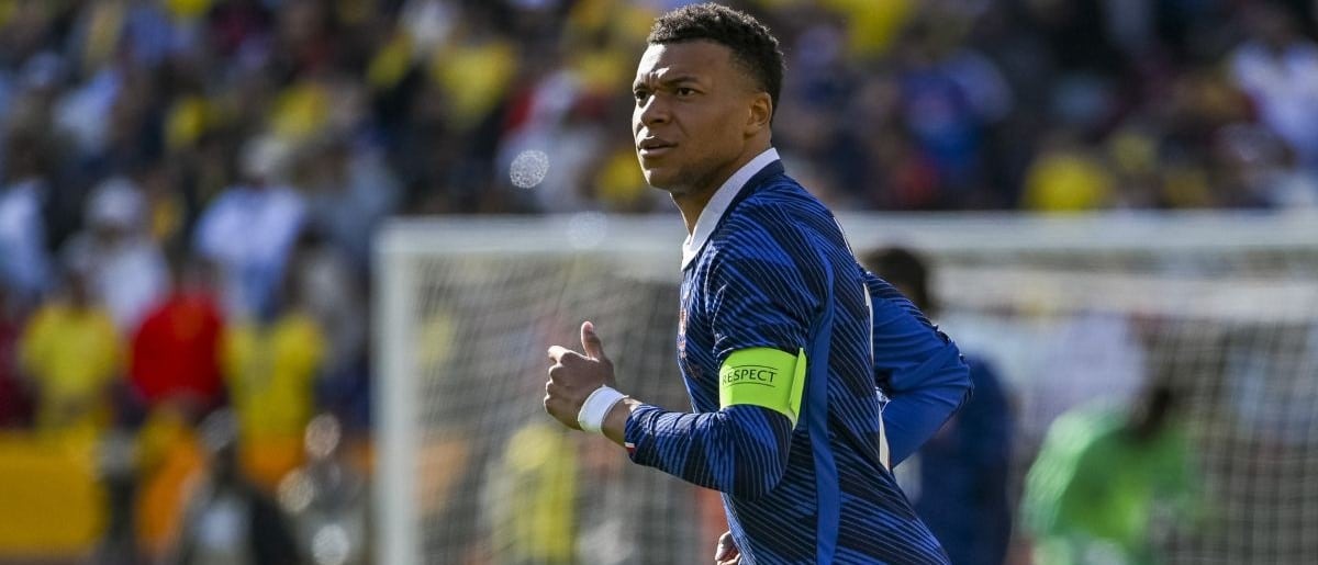 France forward Kylian Mbappe (10) runs across the field during the second half of an international friendly match against Colombia at Northwest Stadium