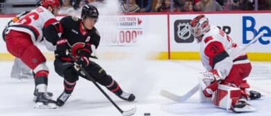 Ottawa Senators center Tim Stutzle (18) moves the puck in front of Carolina Hurricanes fgoalie Frederik Andersen (31) in the first period at the Canadian Tire Centre