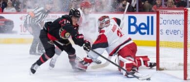 Ottawa Senators center Tim Stutzle (18) scores against Carolina Hurricanes fgoalie Frederik Andersen (31) in the first period at the Canadian Tire Centre