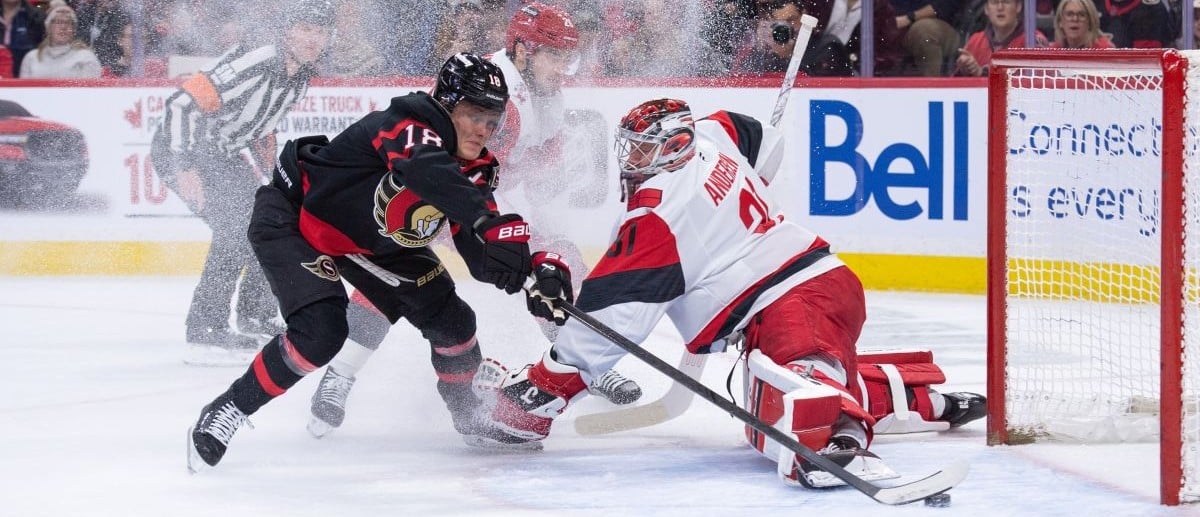 Ottawa Senators center Tim Stutzle (18) scores against Carolina Hurricanes fgoalie Frederik Andersen (31) in the first period at the Canadian Tire Centre