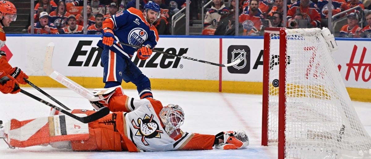 Edmonton Oilers center Jason Dickinson (16) watches the puck go past Anaheim Ducks goalie Lukas Dostal (1) in game one of the first round of the 2026 Stanley Cup Playoffs during the first period at Rogers Place