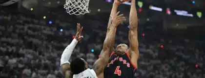 Apr 29, 2026; Cleveland, Ohio, USA; Toronto Raptors forward Scottie Barnes (4) drives to the basket beside Cleveland Cavaliers guard Donovan Mitchell (45) in the first quarter of game five of the first round of the 2026 NBA Playoffs at Rocket Arena.