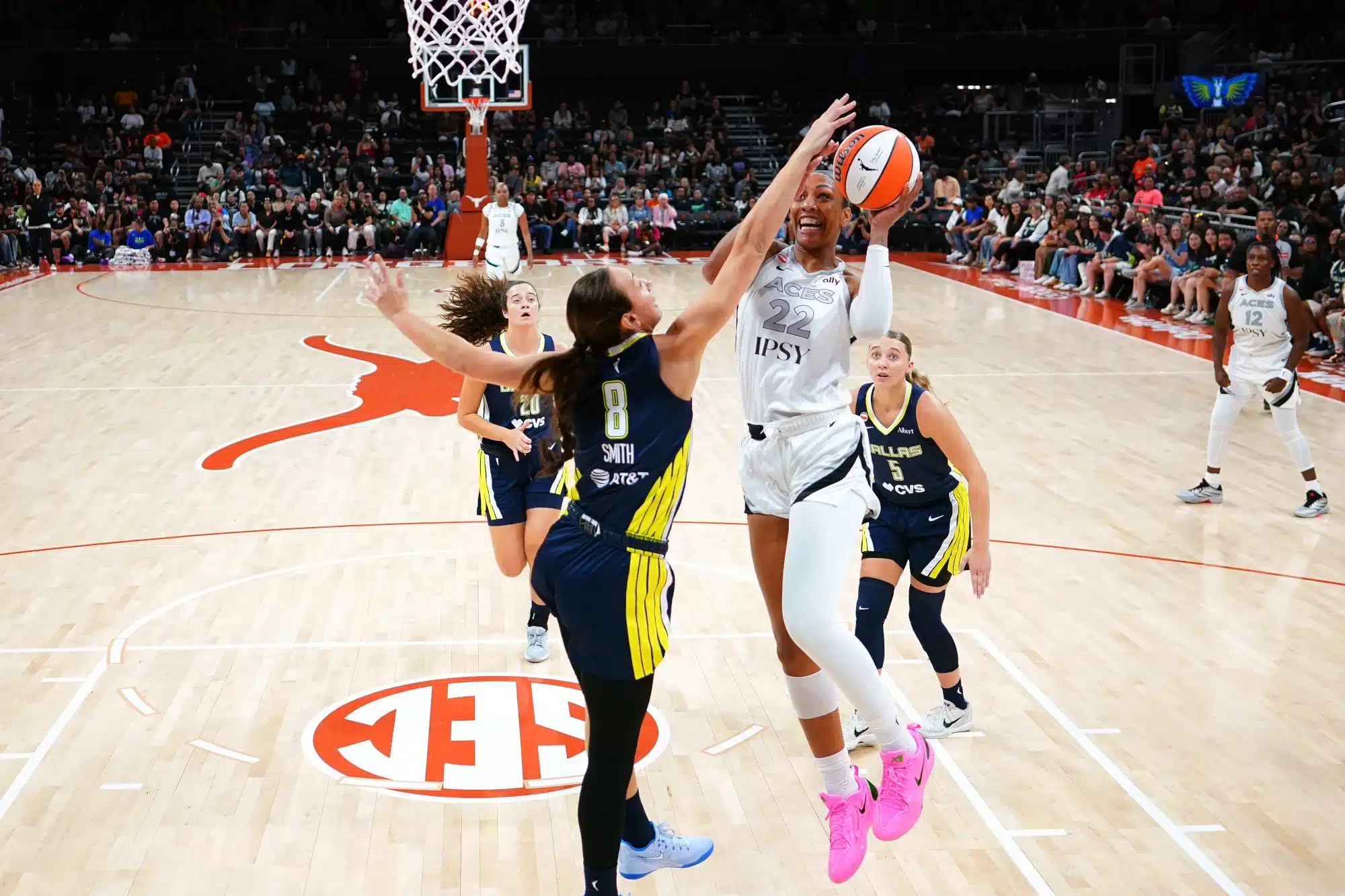 May 3, 2026; Austin, TX, USA; Las Vegas Aces center A’ja Wilson (22) drives to the basket against Dallas Wings forward Alanna Smith (8) during the first half at Moody Center.