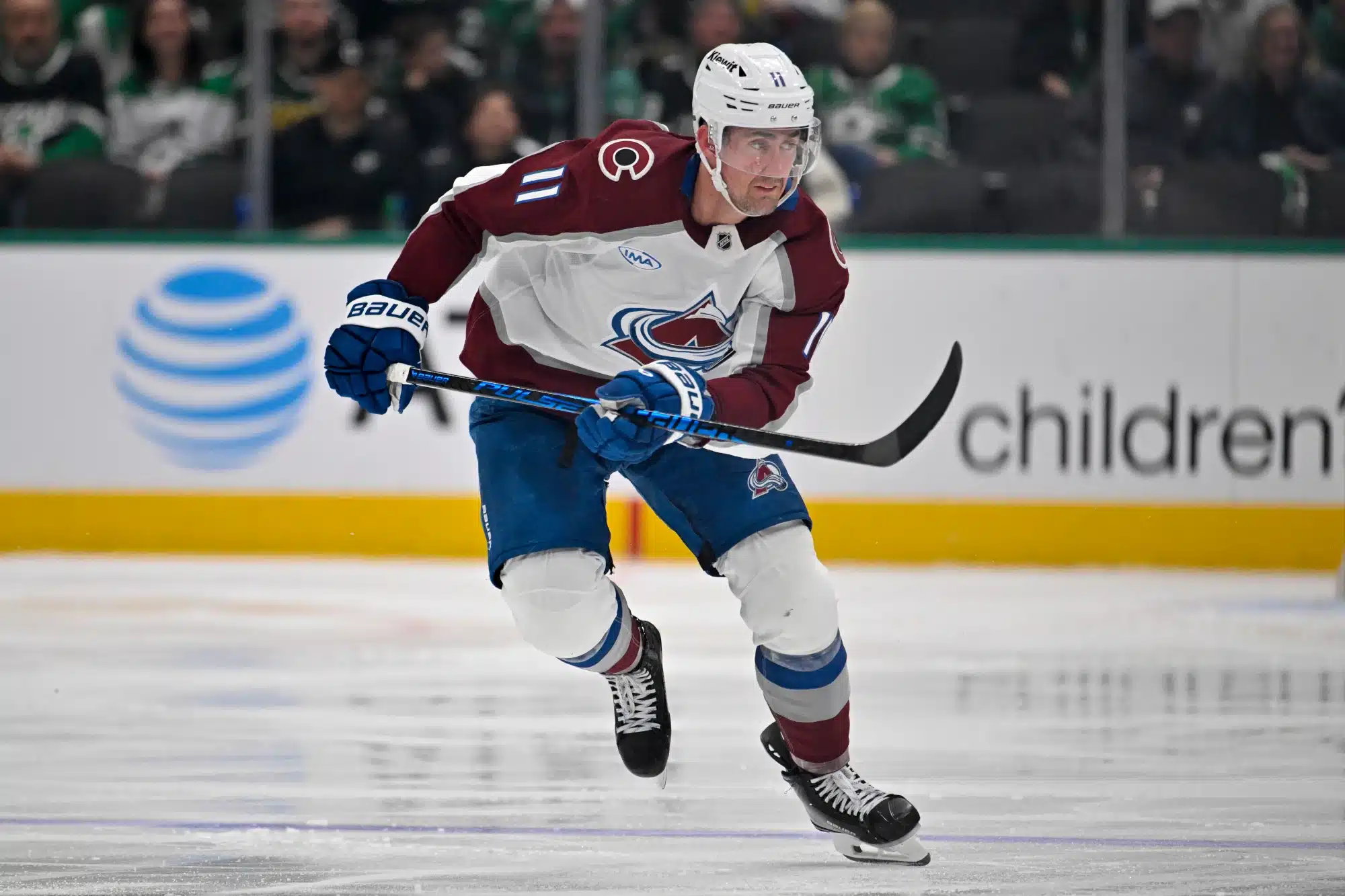 Apr 4, 2026; Dallas, Texas, USA; Colorado Avalanche center Brock Nelson (11) skates against the Dallas Stars during the game between the Stars and the Avalanche at American Airlines Center.