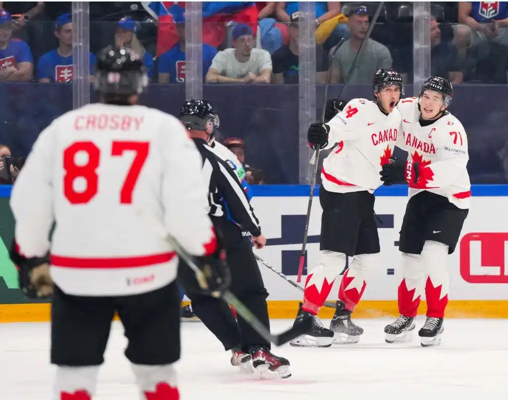 May 24, 2026: Canada's Dylan Cozens celebrates a goal against Slovakia with Macklin Celebrini and Sidney Crosby in Group B action at the 2026 IIHG Men's World Championships