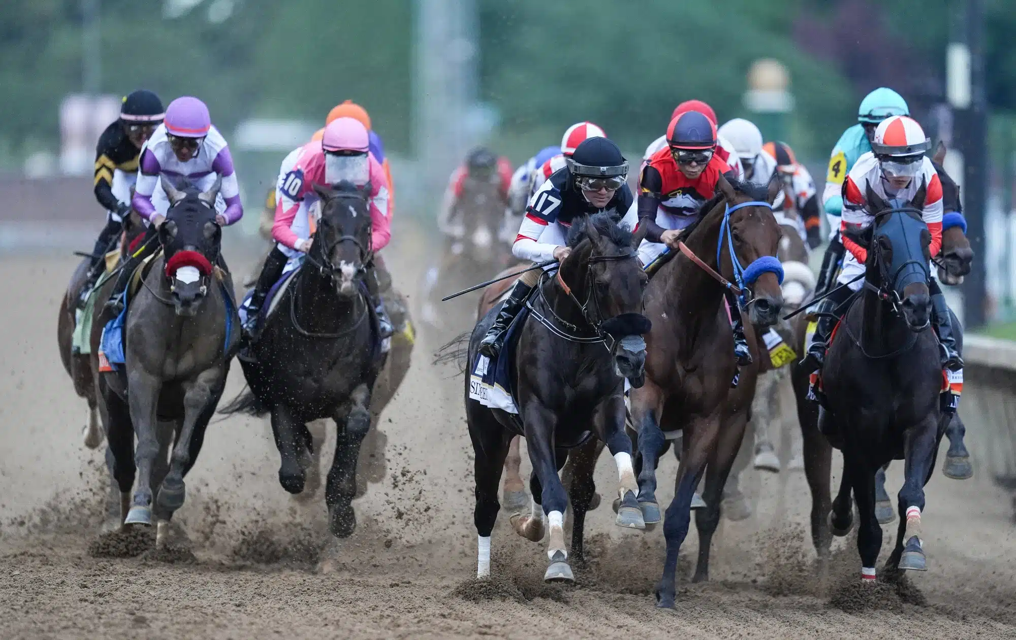 The field of the 2026 Kentucky Derby heads into the first turn during the Derby race at Churchill Downs. May 2, 2026.