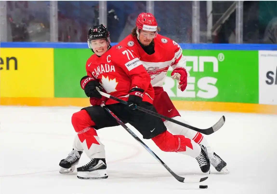May 18, 2026: Macklin Celebrini battles for the puck against Denmark in Preliminary Round - Group B action at the IIHF Ice Hockey World Championships.