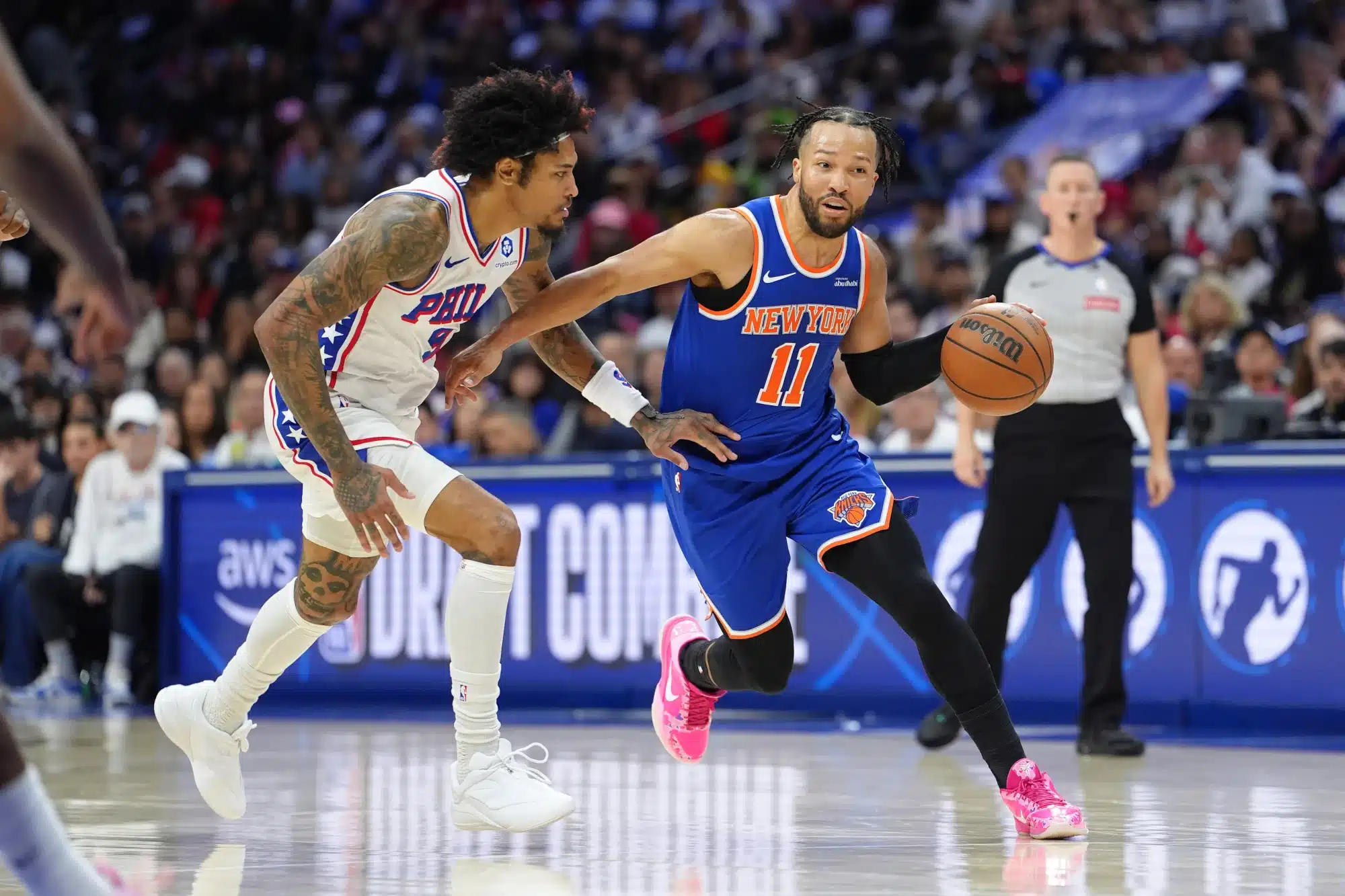 May 10, 2026; Philadelphia, Pennsylvania, USA; New York Knicks guard Jalen Brunson (11) drives against Philadelphia 76ers guard Kelly Oubre Jr (9) in the second quarter during game four of the second round of the 2026 NBA Playoffs at Xfinity Mobile Arena. 