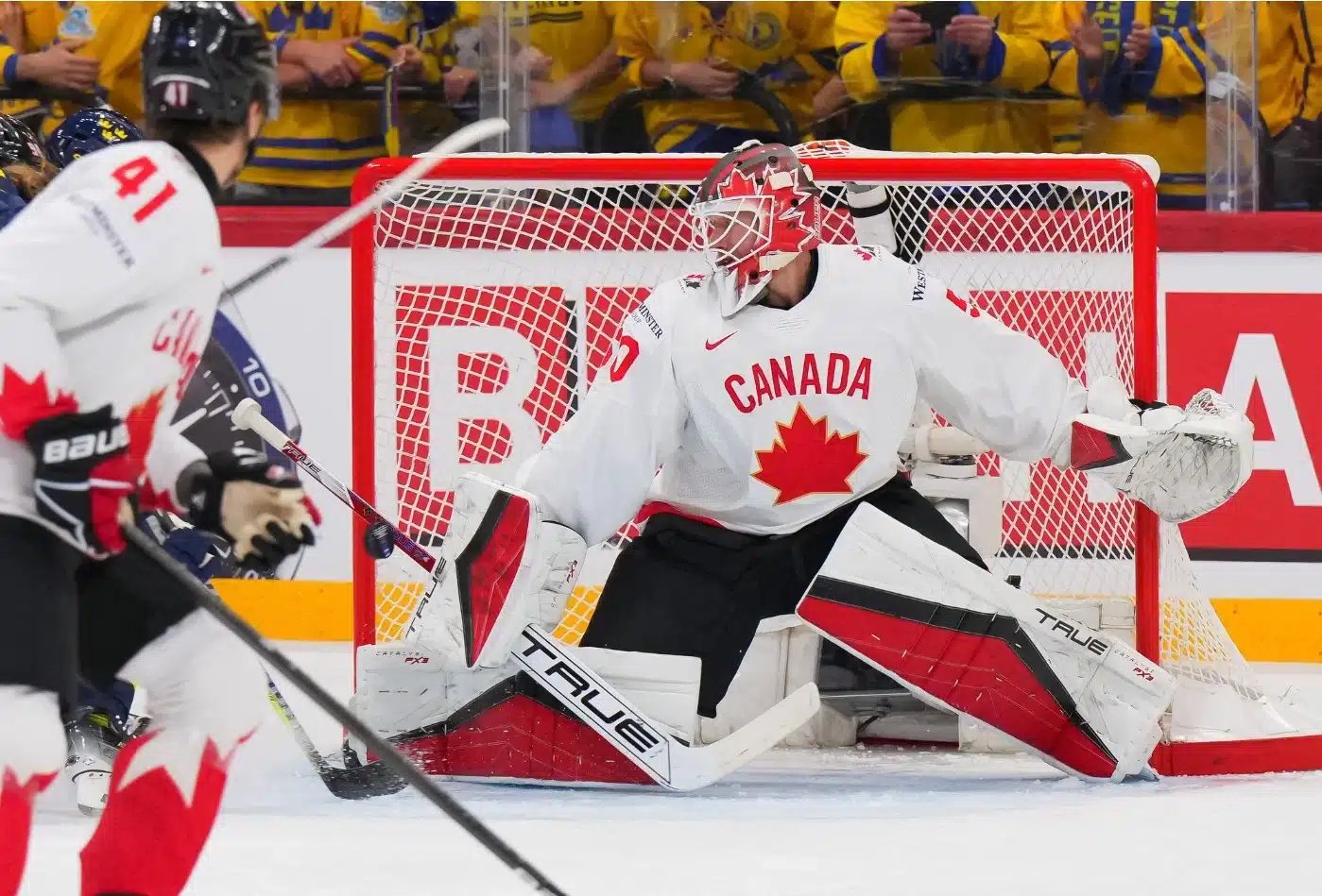 May 20: Canada's Jordan Binnington makes a stick save during the preliminary round against Sweden at the 2025 Ice Hockey World Championship.