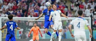 United States of America defender Tim Ream (13) battles for a header against England forward Harry Kane (9) during the first half of a group stage match during the 2022 World Cup at Al Bayt Stadium.