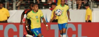 Brazil midfielder Raphinha (11) pursues the ball against Colombia midfielder Jhon Arias (obscured) during the second half at Levi's Stadium