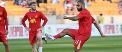 Liverpool forward Mohamed Salah (11) warms up for a match against Real Betis at Acrisure Stadium.