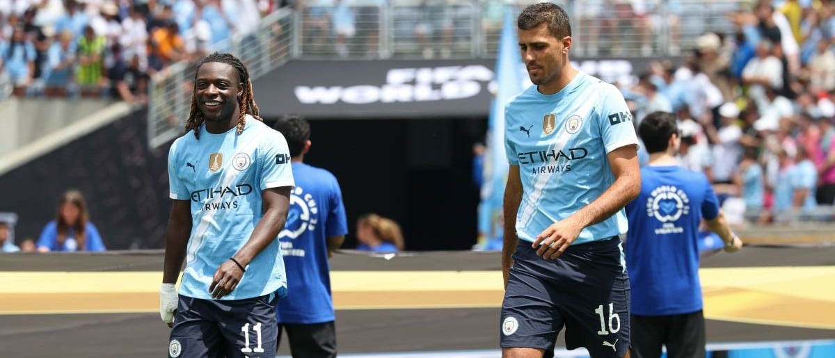 Manchester City midfielder Jeremy Doku (11) and midfielder Rodri (16) during warmups before a group stage match of the 2025 FIFA Club World Cup at Camping World Stadium