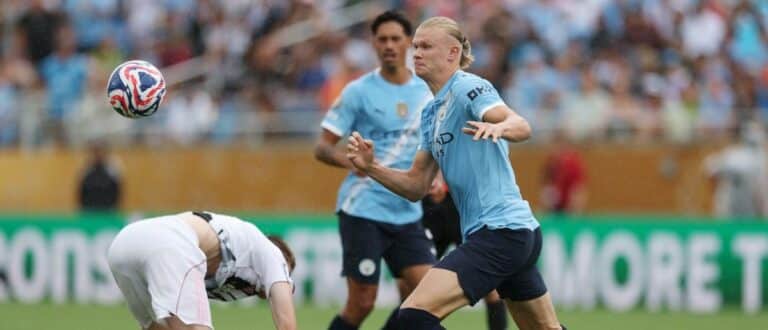 Manchester City forward Erling Haaland (9) battles for the ball against Juventus FC defender Nicolo Savona (37) during the second half during a group stage match of the 2025 FIFA Club World Cup at Camping World Stadium