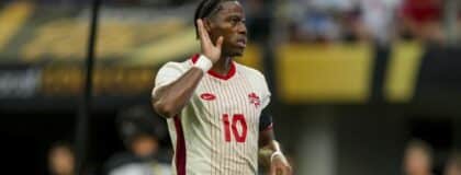 Canada forward Jonathan David (10) celebrates scoring a penalty goal during the first half during a quarterfinal match of the 2025 Gold Cup at U.S. Bank Stadium