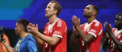 FC Bayern Munich forward Harry Kane (9) and defender Jonathan Tah (4) react a quarterfinal match of the 2025 FIFA Club World Cup against Paris Saint-Germain at Mercedes-Benz Stadium.