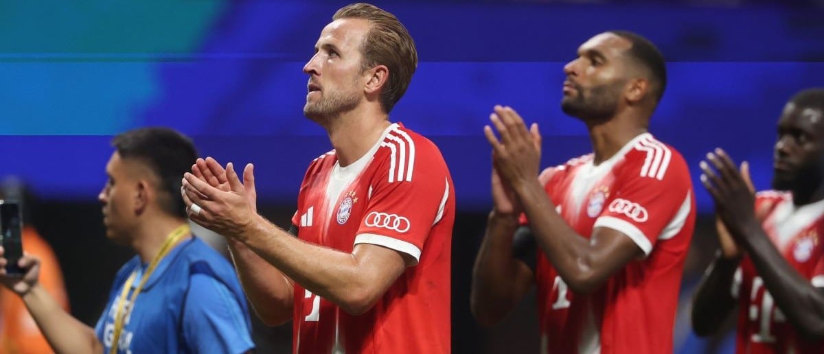 FC Bayern Munich forward Harry Kane (9) and defender Jonathan Tah (4) react a quarterfinal match of the 2025 FIFA Club World Cup against Paris Saint-Germain at Mercedes-Benz Stadium.