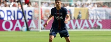 Paris Saint-Germain defender Achraf Hakimi (2) controls the ball against Real Madrid CF during the second half during a semifinal match of the 2025 FIFA Club World Cup at MetLife Stadium.