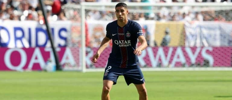 Paris Saint-Germain defender Achraf Hakimi (2) controls the ball against Real Madrid CF during the second half during a semifinal match of the 2025 FIFA Club World Cup at MetLife Stadium.