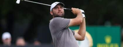 Scottie Scheffler plays his shot from the 11th tee during the second round of the TOUR Championship golf tournament