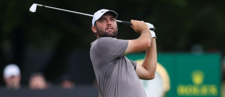 Scottie Scheffler plays his shot from the 11th tee during the second round of the TOUR Championship golf tournament