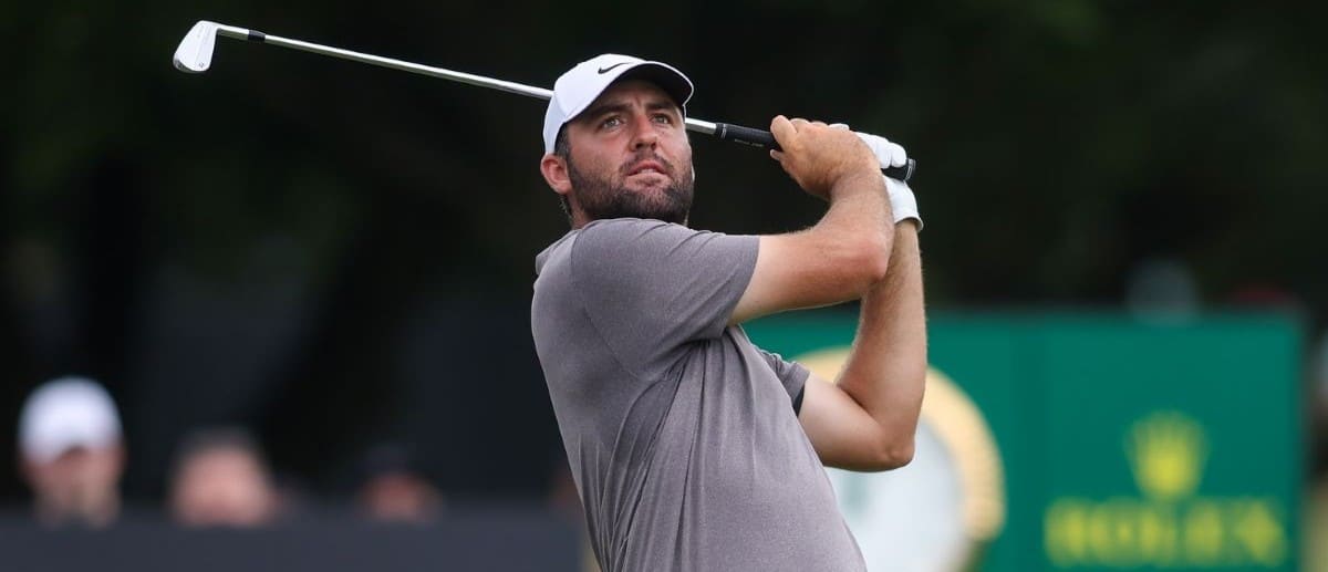 Scottie Scheffler plays his shot from the 11th tee during the second round of the TOUR Championship golf tournament