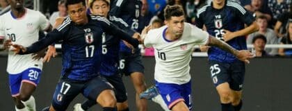United States forward Christian Pulisic (10) fights with Japan midfielder Joel Chima Fujita (17) during an international friendly soccer match at Lower.com Field in Columbus on Sept. 9, 2025. The United States Men's National Team won 2-0.