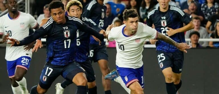 United States forward Christian Pulisic (10) fights with Japan midfielder Joel Chima Fujita (17) during an international friendly soccer match at Lower.com Field in Columbus on Sept. 9, 2025. The United States Men's National Team won 2-0.