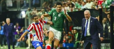Paraguay forward Antonio Sanabria (9) and Mexico forward Raul Jimenez (9) fight for the ball in the second half in a match between Mexico and Paraguay at the Alamodome