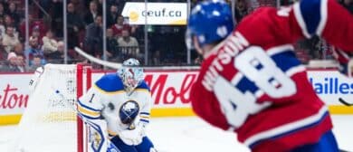Buffalo Sabres goalie Ukko-Pekka Luukkonen (1) stops a shot from Montreal Canadiens defenseman Lane Hutson (48) during the third period at the Bell Centre.