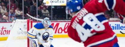 Buffalo Sabres goalie Ukko-Pekka Luukkonen (1) stops a shot from Montreal Canadiens defenseman Lane Hutson (48) during the third period at the Bell Centre.