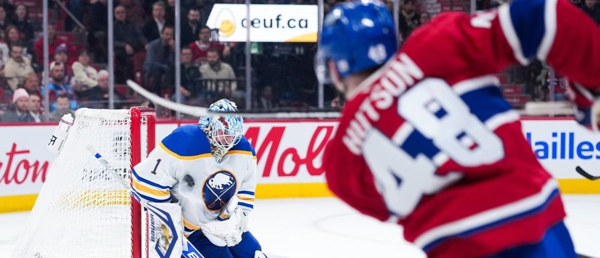 Buffalo Sabres goalie Ukko-Pekka Luukkonen (1) stops a shot from Montreal Canadiens defenseman Lane Hutson (48) during the third period at the Bell Centre.