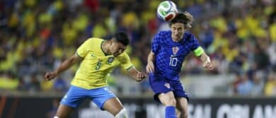 Croatia midfielder Luka Modric (10) heads the ball [past Brazil midfielder Casemiro (5) in the first half during an international friendly at Camping World Stadium