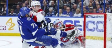 Montreal Canadiens defenseman Lane Hutson (48) blocks Tampa Bay Lightning center Anthony Cirelli (71) from shooting in the first period during game five of the first round of the 2026 Stanley Cup Playoffs at Benchmark International Arena.