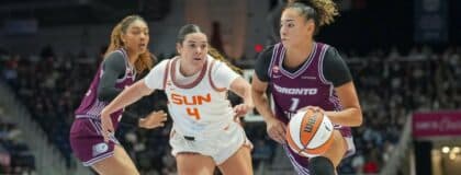Toronto Tempo guard Lexi Held (1) dribbles against the Connecticut Sun during the first half at Coca-Cola Coliseum