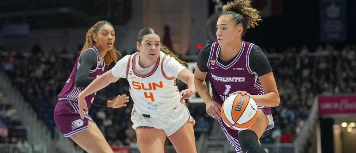 Toronto Tempo guard Lexi Held (1) dribbles against the Connecticut Sun during the first half at Coca-Cola Coliseum
