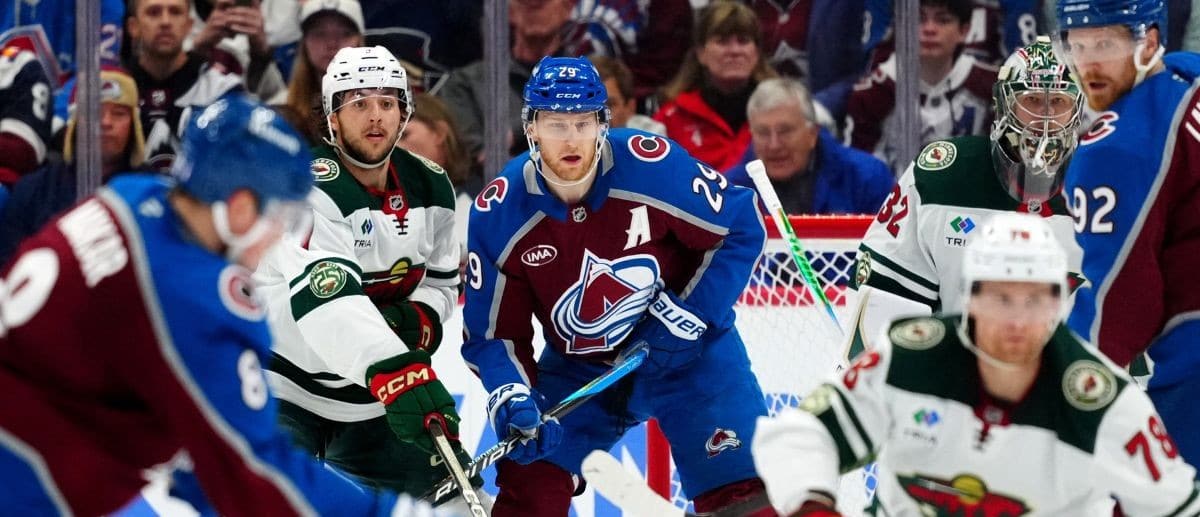 Colorado Avalanche center Nathan MacKinnon (29) awaits the puck during the third period against the Minnesota Wild in game two of the second round of the 2026 Stanley Cup Playoffs at Ball Arena
