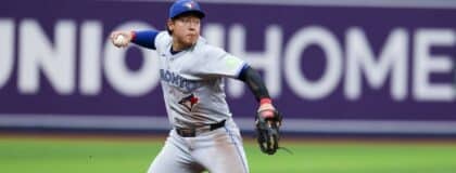 Toronto Blue Jays third baseman Kazuma Okamoto (7) throws to first against the Tampa Bay Rays in the eighth inning at Tropicana Field.
