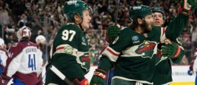 Minnesota Wild right wing Ryan Hartman (38) is congratulated by teammates after scoring on the Colorado Avalanche in the second period of game three of the second round of the 2026 Stanley Cup Playoffs at Grand Casino Arena.