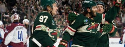 Minnesota Wild right wing Ryan Hartman (38) is congratulated by teammates after scoring on the Colorado Avalanche in the second period of game three of the second round of the 2026 Stanley Cup Playoffs at Grand Casino Arena.